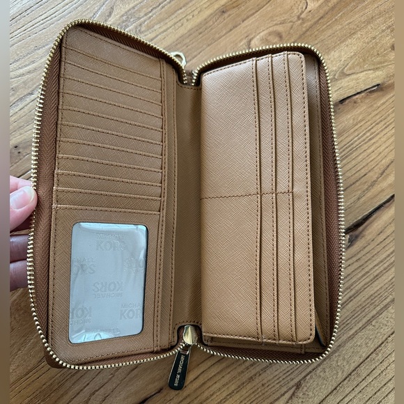 Michael Kors Pebbled Leather Continental Wristlet - Picture 4 of 5